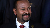 Ethiopia's Prime Minister Abiy Ahmed poses during the opening of the 33rd Ordinary Session