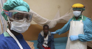 Doctors Attend To A Lassa Fever Patient In Nigeria