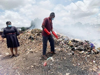 Mr Atsu clearing the dump after his arrest