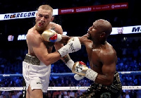 Floyd Mayweather Jnr defeated Conor MacGregor in round 10 to remain undefeated