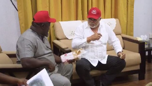 Hammer of A1 Bread [L] with Former President Rawlings [R]