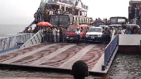 Afram Plains ferry loaded with cars and commuters