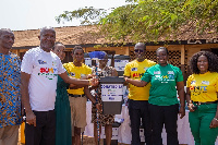 The Human Resources Manager of Vivo Energy Ghana, Mercy Amoah(right) presenting cleaning items