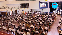 A photo of a congregation in white