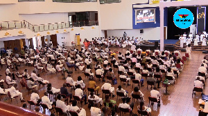 A photo of a congregation in white