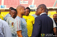 Dede Ayew interacting with the chairman of the Black Stars management committee KK Sarpong