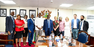 Idris Elba and his team visit the Govenor of the Bank of Ghana