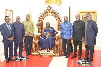 Asantehene, Otumfuo Osei Tutu II and a delegation from Rocksure International in a group picture