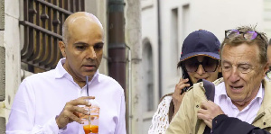 Hinduja (L) and his wife Namrata arrive with their lawyer Assael at a court house in Geneva