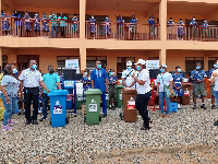 Officials of Nestlé Ghana Limited making the donation to one of the selected schools in Tema