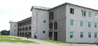 A newly constructed one-storey 10-unit block of flats for the Kibi Presbyterian College of Education