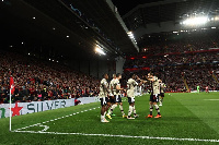 Ajax players celebrate Mohammed Kudus' goal at Anfield