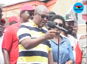 Former President John Dramani Mahama addressing the crowd at the end of the walk