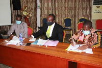 Mr Emmanuel T. Jumpah (extreme right in African print) and some participants at the workshop