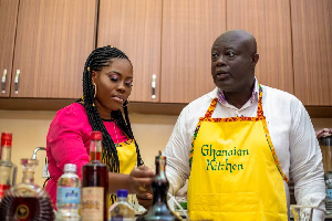 GIHOC Distilleries CEO, Maxwell Kofi Jumah with the host in the kitchen