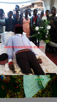 Osei Tawiah was buried yesterday June 16 with a gun, eggs, machete etc