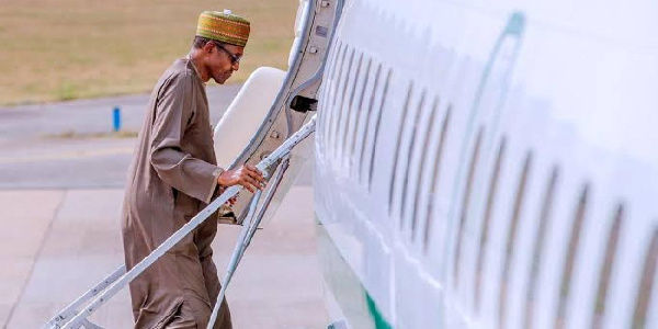 President Buhari boarding a plane