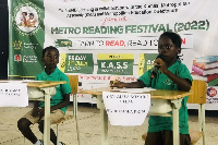 A pupil delivering a speech during the reading competition