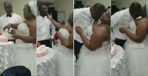 The bride puts the cake in-between her boobs for her husband to taste