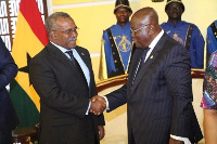 President Akufo-Addo shaking hands with Mr Wendell Vincent Carlton