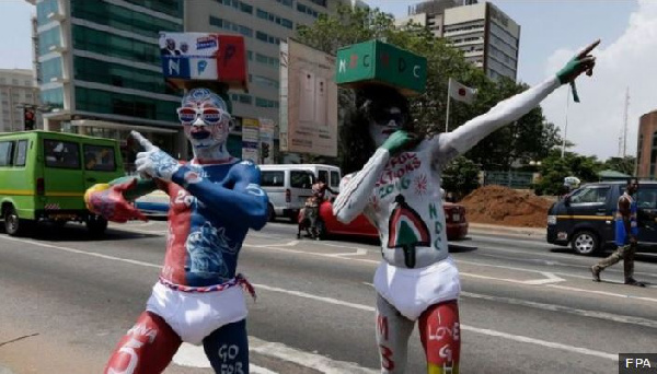 People in Accra pose in support of Ghana's leading election candidates