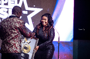 Empress Gifty receiving her award