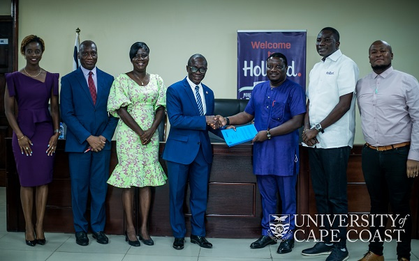 Representatives from Hollard and University of Cape Coast in a photo