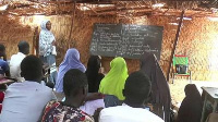 A teacher teaching the students