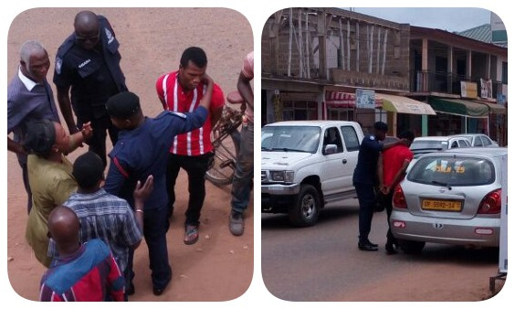 The young man [in red and white striped shirt] after his arrest