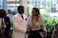 Archbishop Charles Agyinasare with a US govt Official