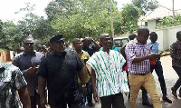 Koku Anyidoho [in black] was picked up by the police over 'treasonable' comments