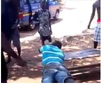 One of the victim being beaten