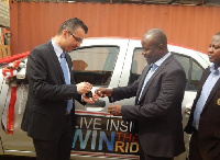 Mr. Jihazi (left), CEO - PML, handing over the Renault car to Mr. Agyeman (right), CEO - GMABC (1)