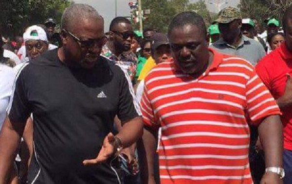 John Dramani Mahama (left) chating with Koku Anyidoho (right)