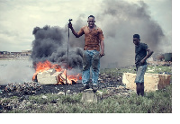 People at a burning site