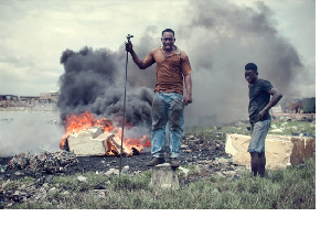 People at a burning site