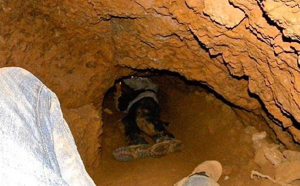 File: The abandoned galamsey pit had been turned into a play swimming pool for kids in the area