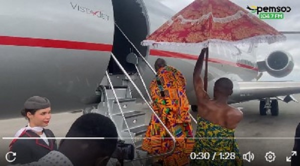 Otumfuo Osei Tutu II entering a plan to depart for Trinidad and Tobago on July 30, 2023