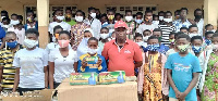 Emmanuel Armah Kofi Buah with the BECE candidates