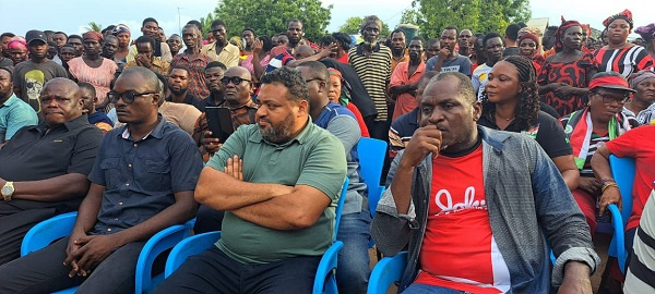 Joseph Yamin with some NDC executives at Toflokpo in the Ada West District