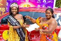 Kwakye, left, receiving her prize