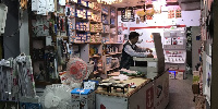 A photo of a Chinese owning an electrical shop