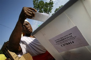 Woman casts her ballot