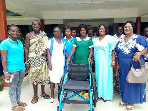 Anna Horma Miezah in a green attire with some nurses and workers of Saint Martin De Pores Hospital