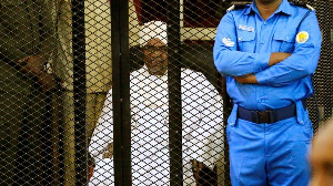 Omar Al Bashir Sat In A Cage