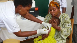 A child receiving treatment for malaria