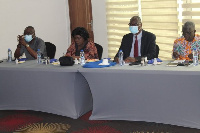 Sanitation Minister Cecilia Dapaah (second left) addressing a gathering in Accra