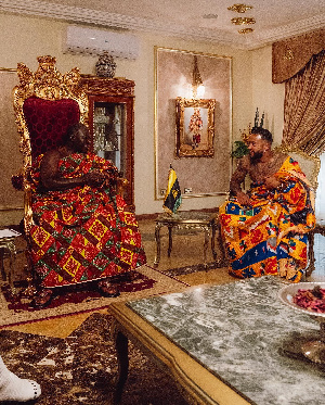 Memphis Depay (right) and Otumfuo Osei Tutu II