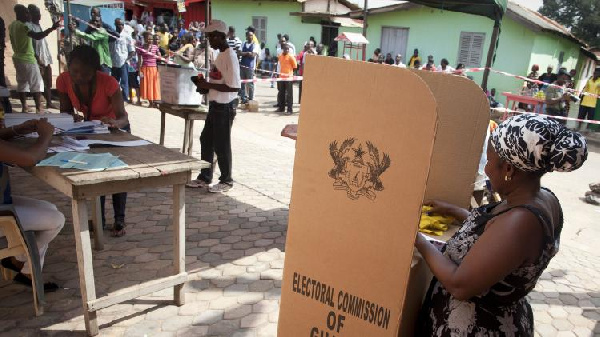 Voters queuing at a polling station to exercise their franchise