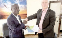 Kwame Gyan, Chairman of Ibistek exchanging the documents with Frederik Mabesoone